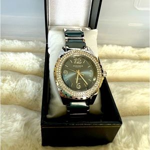 Akribos watch with blue ceramic band